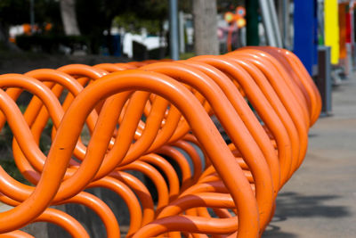 Close-up of orange pipes