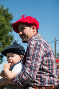 Argentinian father and son in traditional festival