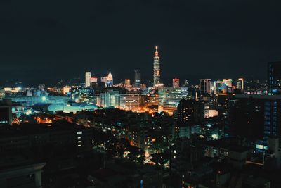 Illuminated cityscape at night