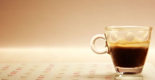 Close-up of a cup of coffee on table