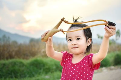 Portrait of cute girl smiling