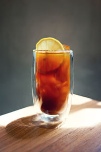 Close-up of tea in glass on table