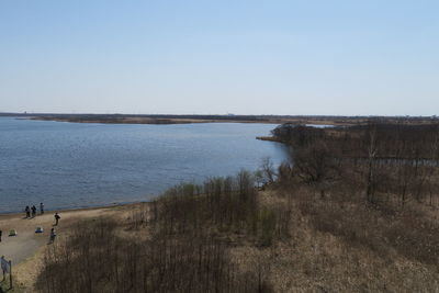 Scenic view of beach against clear sky