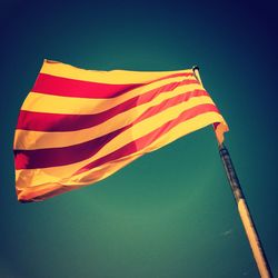 Low-angle view of catalonian flag