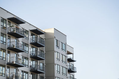 Low angle view of buildings against clear sky