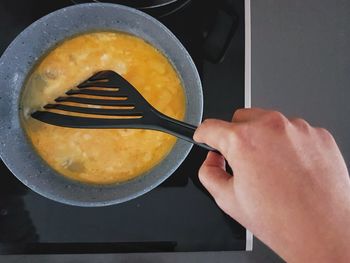 Close-up of person preparing food