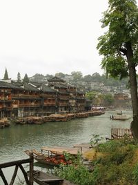 Built structure with trees in foreground