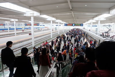 Group of people waiting at airport