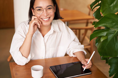 Young woman using mobile phone