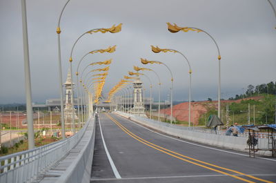 View of bridge over road against sky