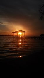 Scenic view of sea at sunset