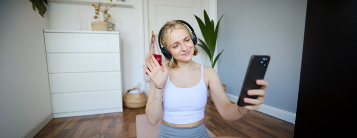 Young woman using mobile phone