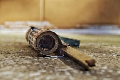 Close-up of obsolete firework on floor