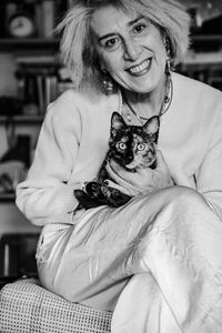 Portrait of young woman with dog