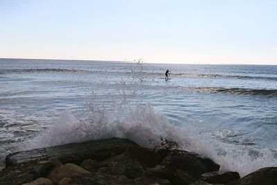 Scenic view of sea against clear sky