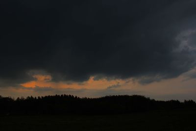 Scenic view of silhouette landscape against sky during sunset