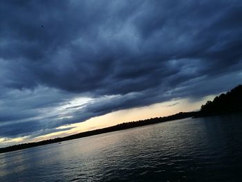 Scenic view of dramatic sky over sea