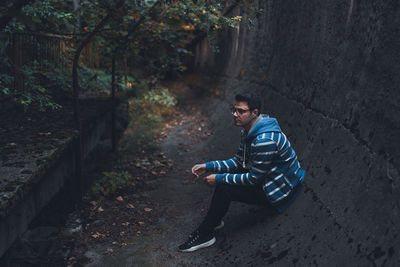 Young man in forest