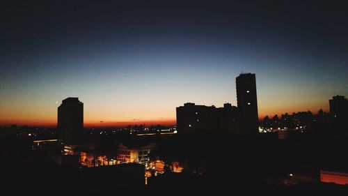 Silhouette of city at night