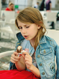 Girl having sweet food