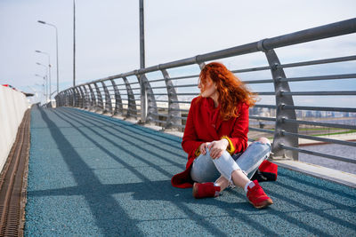 Portrait of a young woman in a red coat