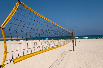 Scenic view of beach against clear sky