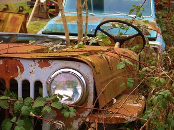 Close-up of abandoned car