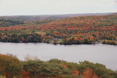 Scenic view of lake against sky during autumn