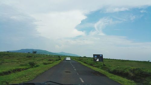 Country road passing through landscape