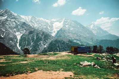 Scenic view of snowcapped mountains against sky