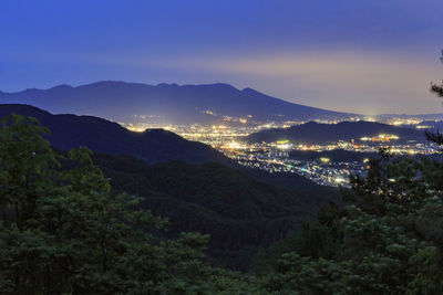 Scenic view of mountains against sky at sunset