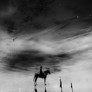 Reflection of people in water