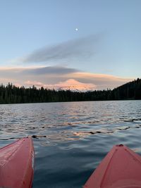 Scenic view of lake against sky during sunset