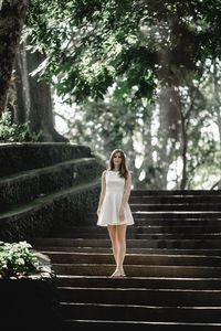 Woman standing on steps