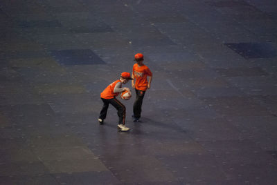High angle view of men with umbrella