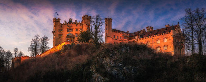 Panoramic view of buildings against sky during sunset