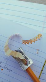 Close-up of paper on table