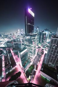 Illuminated cityscape at night