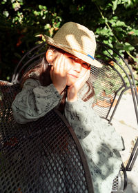 Portrait of girl wearing hat and looking at camera