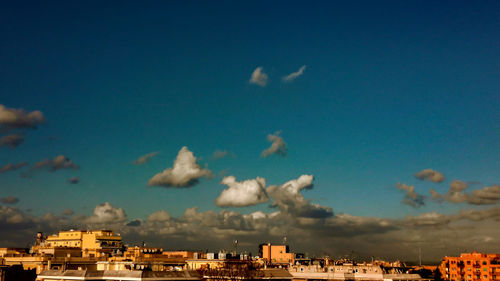 Cityscape against blue sky