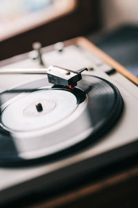 High angle view of turntable and record