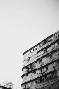 Low angle view of skyscraper against clear sky