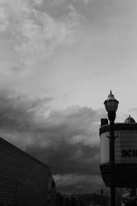 High section of building against cloudy sky