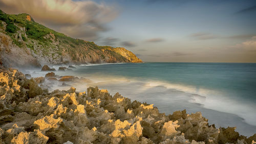 Scenic view of sea against sky during sunset