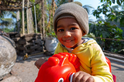 Portrait of smiling boy wearing hat