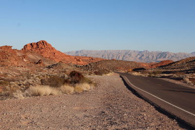 Scenic view of desert against clear sky