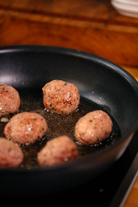 Tasty meatballs frying on hot pan art food, gourmet meal