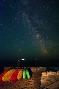 Scenic view of sea against sky at night