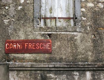 Close-up of text on wall