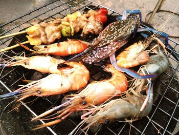 Close-up of meat on barbecue